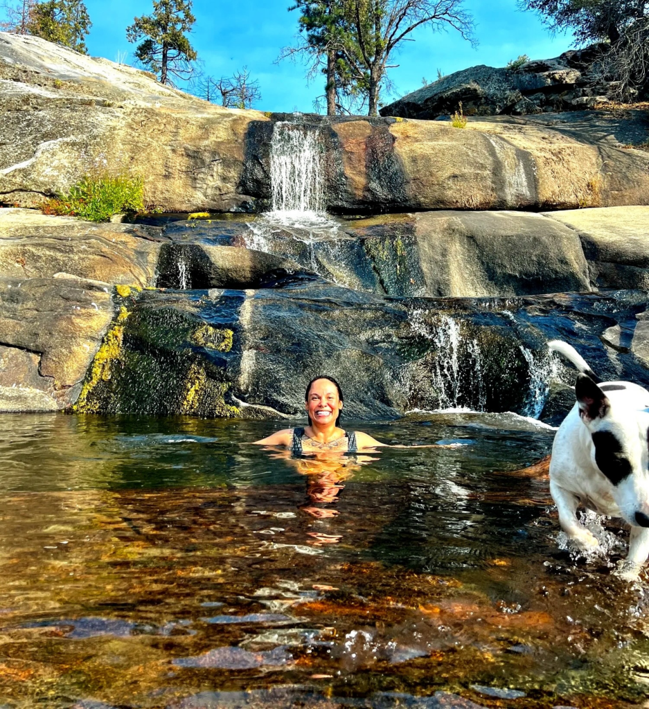 woman swimming at musick creek falls by shaver lake